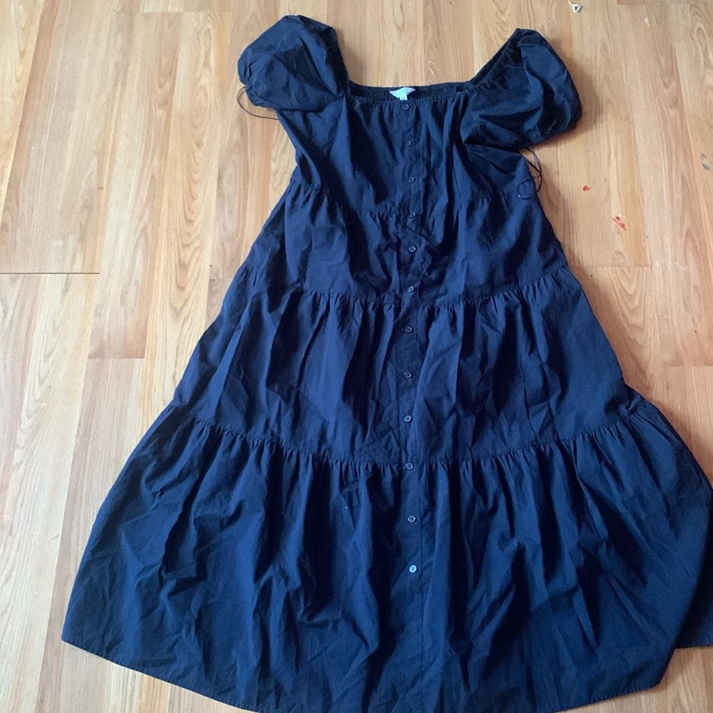 this is a navy blue dress sundress, and the back stretches out